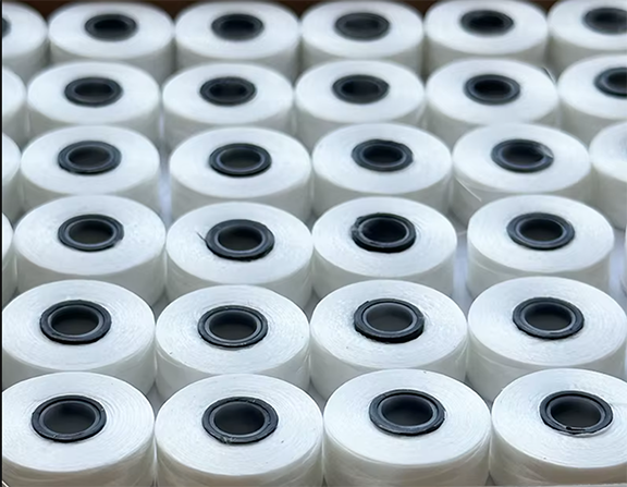 Box of Stitchcraft L-style magnetic core prewound embroidery bobbins